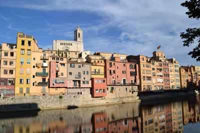 Buildings in city against sky