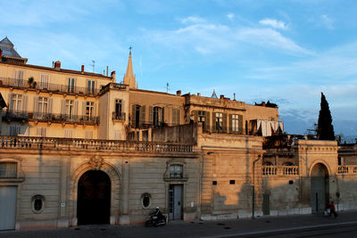 Buildings in city against sky