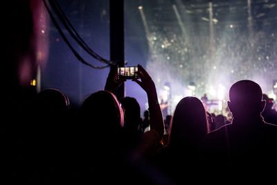 People enjoying music concert