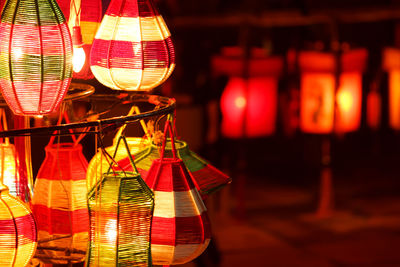 Close-up of lantern hanging at night