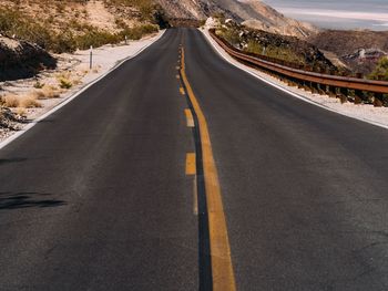 Empty road along highway