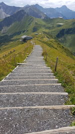 Footpath leading towards mountains