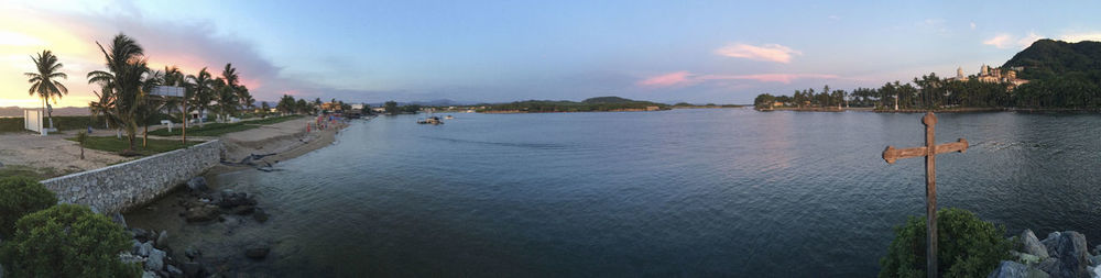 Panoramic view of sea against cloudy sky