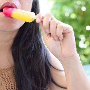 Close-up of woman eating ice cream