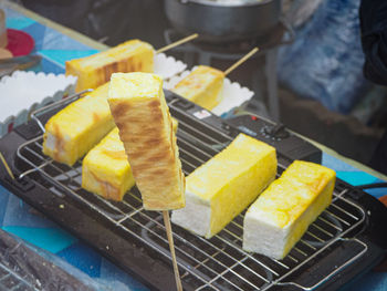 High angle view of meat on barbecue grill