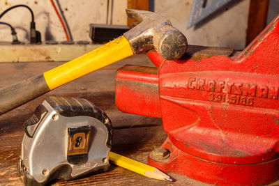 Close-up of work tools on table