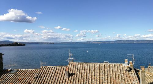 Scenic view of sea against blue sky