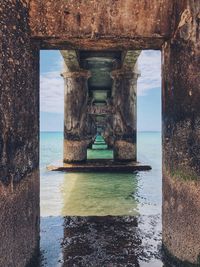 Underneath of bridge at sea 