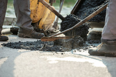 Low section of people working outdoors