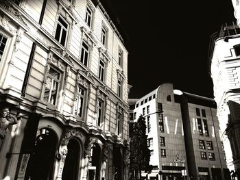 Low angle view of buildings at night