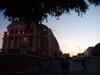 People walking on street in city