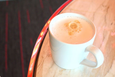 High angle view of coffee cup on table