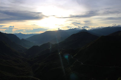 Scenic view of mountains against sky during sunset