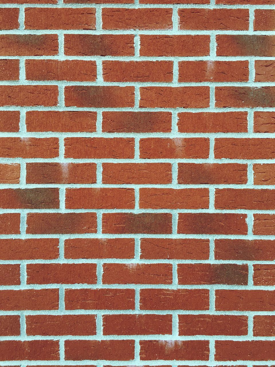 CLOSE-UP VIEW OF BRICK WALL