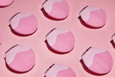High angle view of pink paint on table
