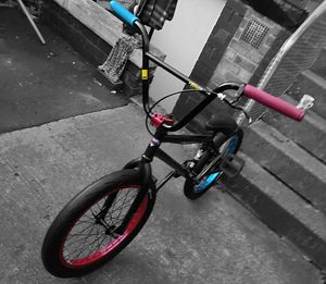 High angle view of bicycle parked on street