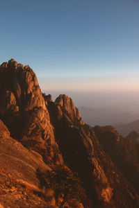 Scenic view of mountains against clear sky