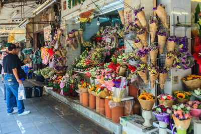 Flowers hanging for sale on store 