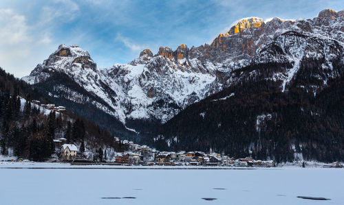 Scenic view of snowcapped mountains against sky