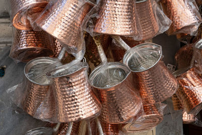 High angle view of coins in basket