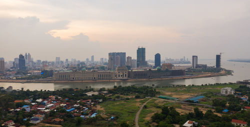 High angle view of buildings in city against sky