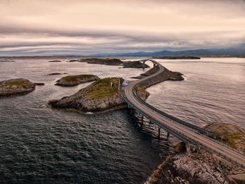 High angle view of road by sea against sky