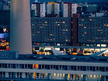 Skyscrapers in city at dusk