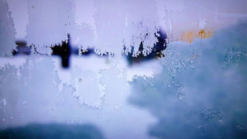 Full frame shot of glass window during winter