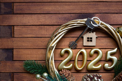 Directly above shot of christmas decorations on wooden table