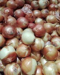 Full frame shot of onions for sale in market