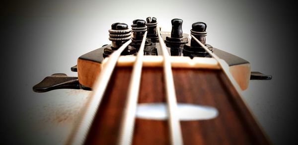 High angle view of guitar on table