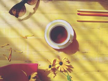 Directly above shot of coffee cup on table