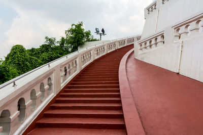 Low angle view of staircase against sky