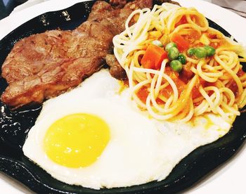 Close-up of breakfast served in plate