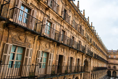 Low angle view of old building against sky