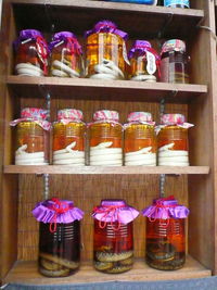 Close-up of multi colored jars