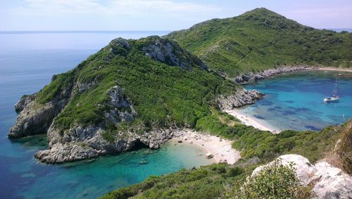 Scenic view of mountain on sea