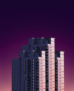 Low angle view of buildings against sky in city