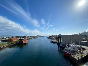 High angle view of harbor by sea against sky