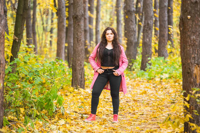 Full length of a woman in forest