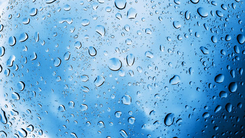 Close-up of water drops on glass