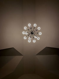 Low angle view of illuminated chandelier