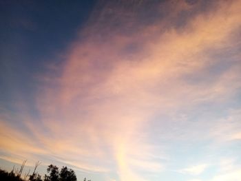 Low angle view of dramatic sky during sunset