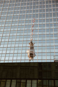 Reflection of fernsehturm on glass building