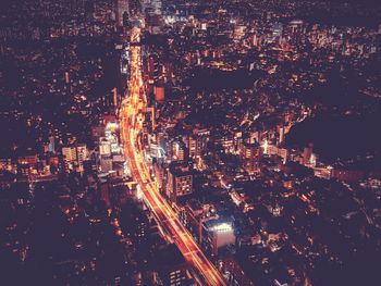 High angle view of illuminated cityscape at night