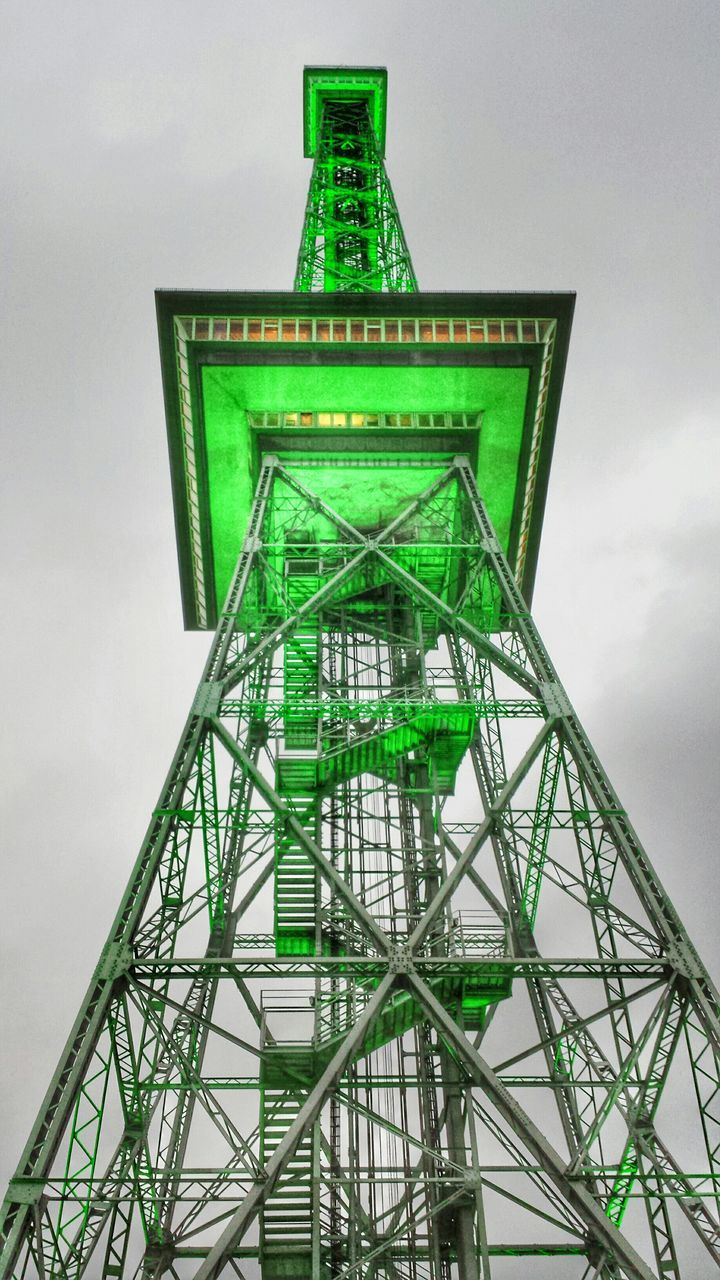 architecture, low angle view, built structure, sky, text, communication, famous place, travel destinations, building exterior, tower, western script, cloud - sky, day, international landmark, metal, tourism, outdoors, no people, travel, capital cities