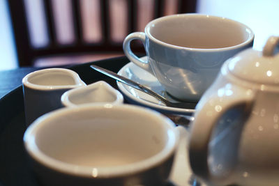 Close-up of coffee cup on table