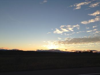 Scenic view of landscape at sunset