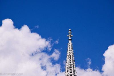 Low angle view of building against blue sky