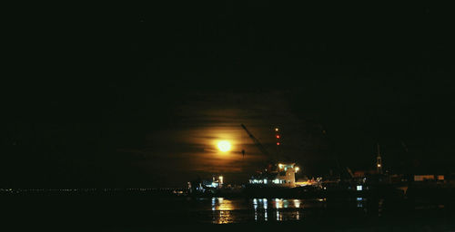 Reflection of illuminated buildings in water